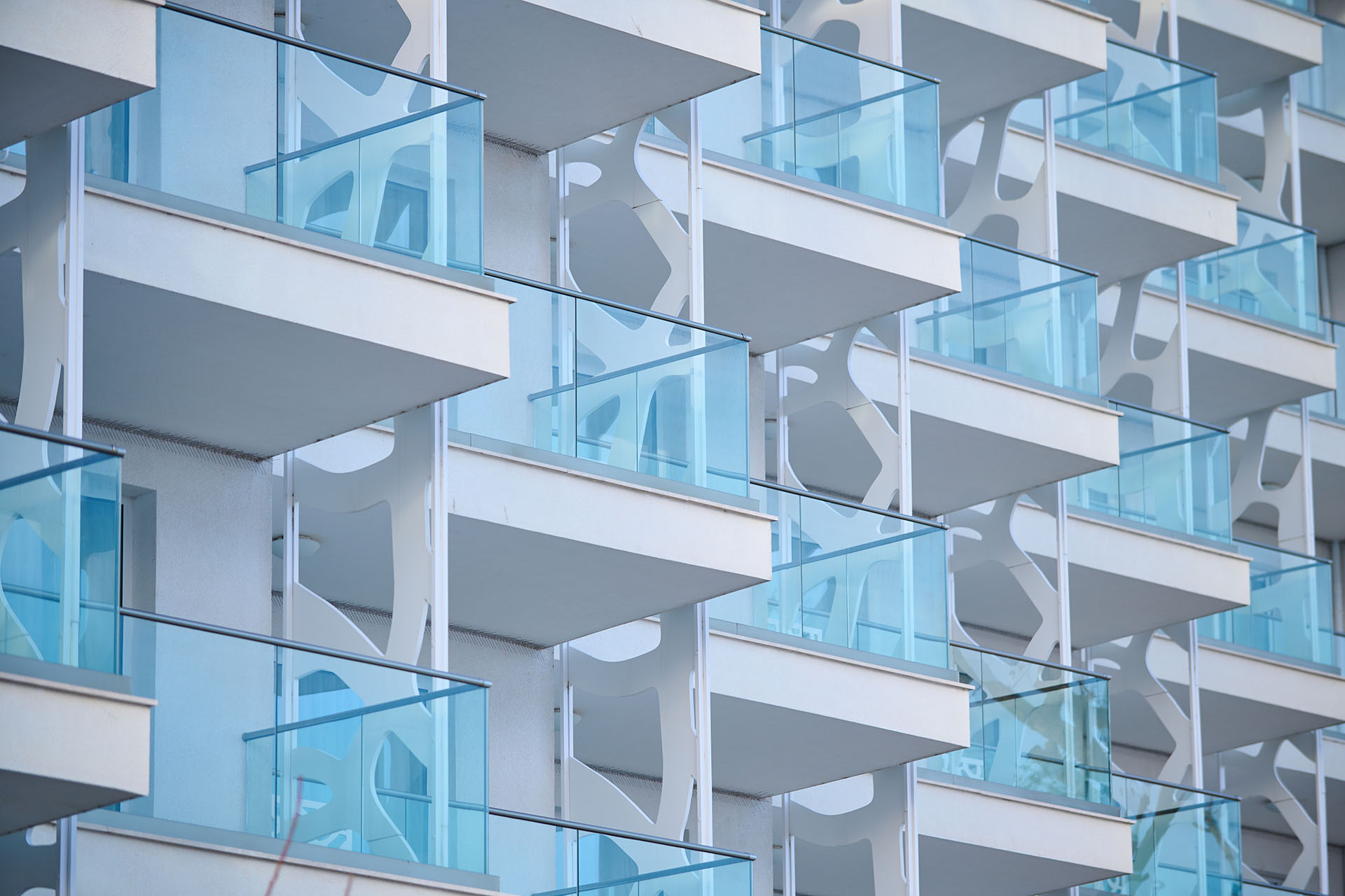 White building hotel with many terraces nobody